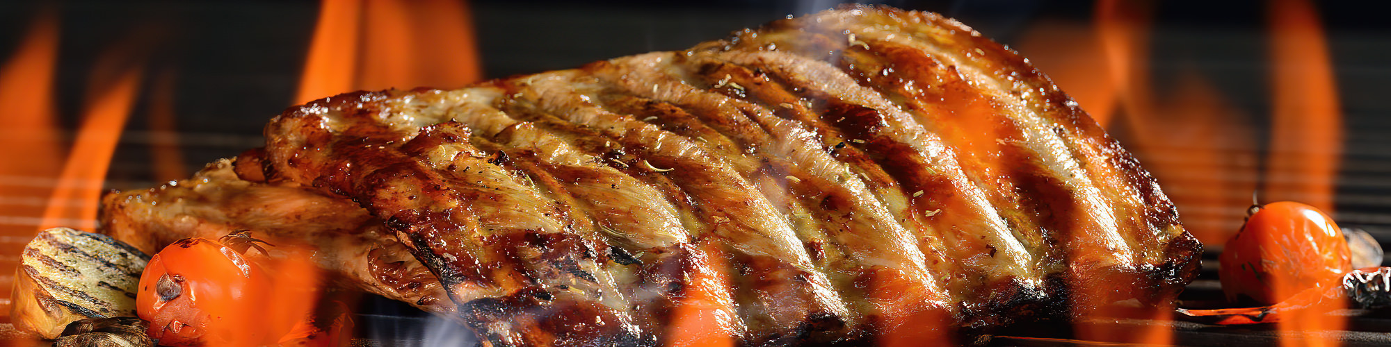 Closeup van spareribs op de grill