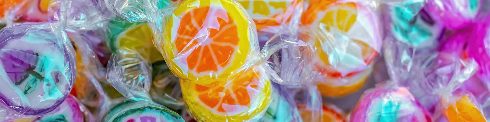 A pile of colored lollipops seen up close