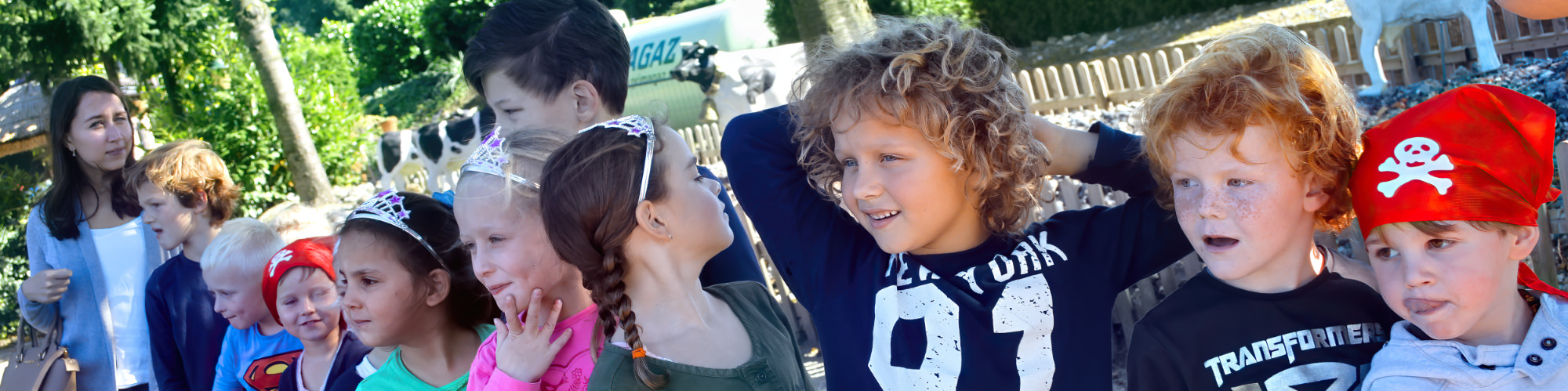 Children queue up for an attraction