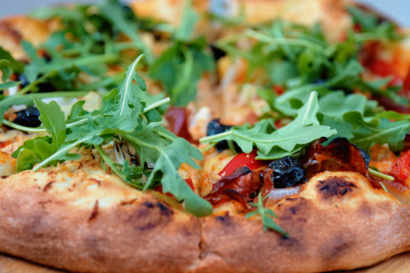 Een echte steenoven pizza bij de Dwaze Herder